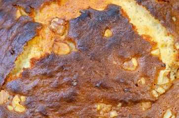 Close up of bake cake crust with nuts dessert