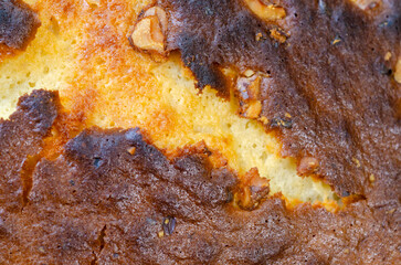 Close up of bake cake crust with nuts dessert