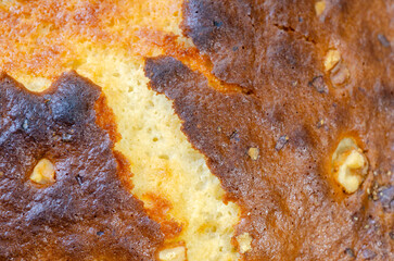 Close up of bake cake crust with nuts dessert