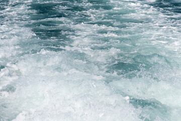 high-angle view of the wake on the sea