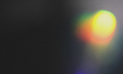 Blur colorful rainbow crystal light leaks on black background. Defocused abstract multicolored retro film lens flare bokeh analog photo overlay or screen filter effect.
