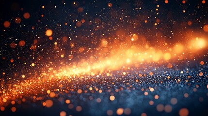 Fototapeta premium Glittering gold and blue particles swirl, dark background, festive design element