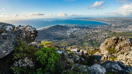 Incredible view of Cape town from above at Table Mountain national park with rocks and blue sky, Cape Town, Western Cape, South Africa, Africa