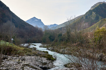 Peaceful nature trail along Rio Dobra towards the stunning Olla de San Vicente in Asturias