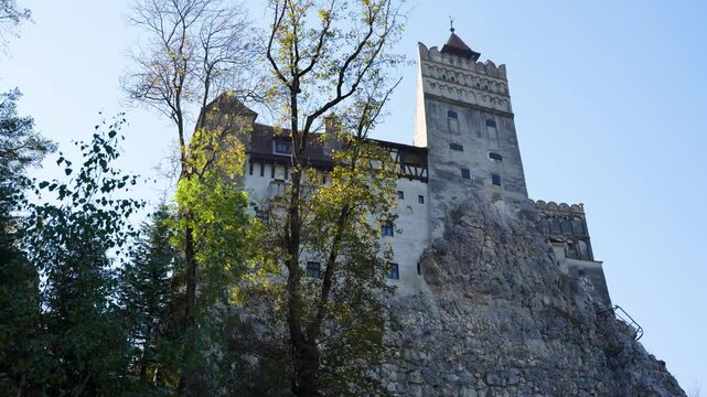 Strada General Traian Mosoiu 24, Bran 507025, Romania - October 23, 2024: Bran Castle &ndash; Legendary Fortress of Transylvania. Zoom in transition.