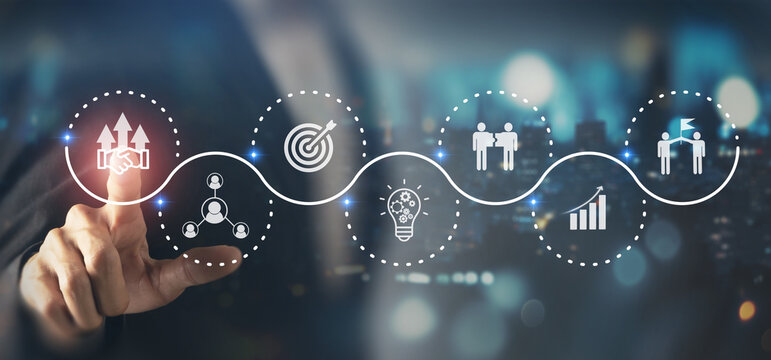 Business ecosystems and partnerships concept. Business collaboration strategies. Touching screen with partnership icons for the networking and solution of creating new opportunities.