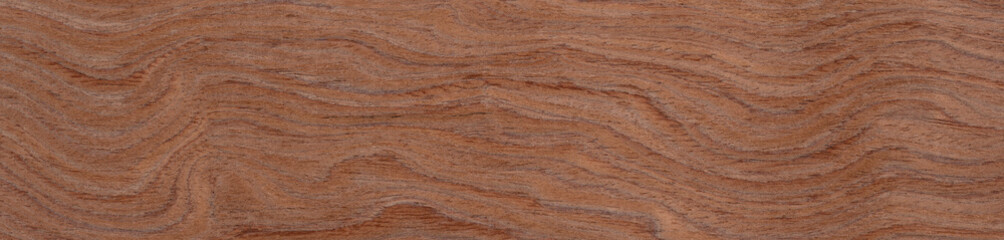 Waves of rich auburn and copper tones ripple across this veneer wooden surface