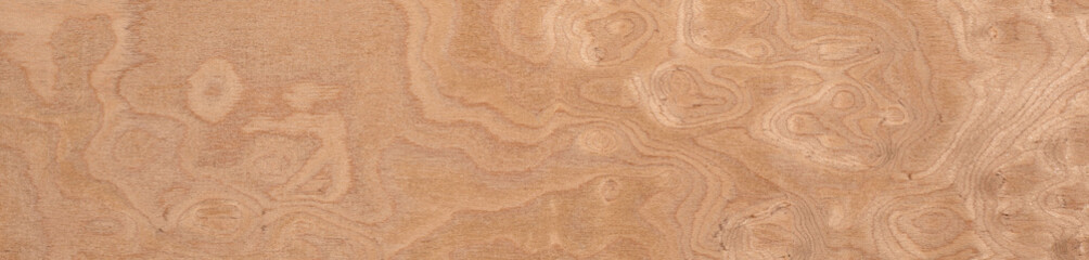 Autumnal warmth in wood, a tapestry of cherry burl veneer with caramel swirls and auburn waves