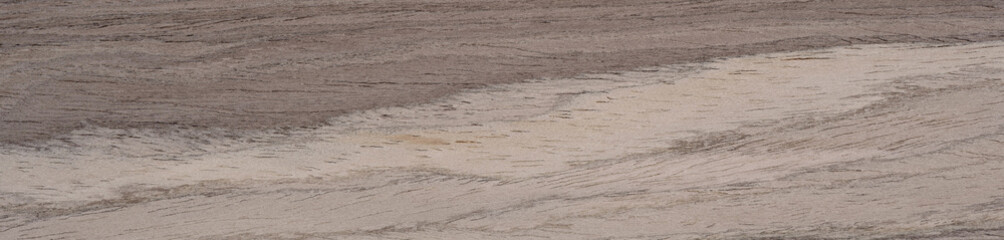 Earthy wooden veneer with natural stripes and organic texture