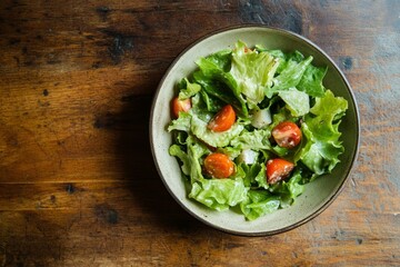 Fresh caesar salad with croutons and dressing on gray surface. AI generated