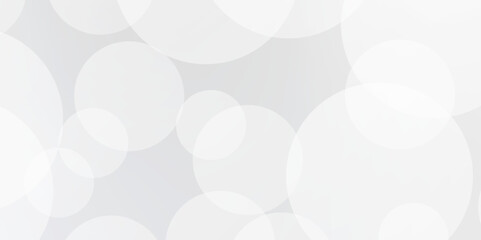 Blurry white sparkling and shiny abstract background. A brilliant blurry white background for a festive mood. Template for greeting card for entertainment.