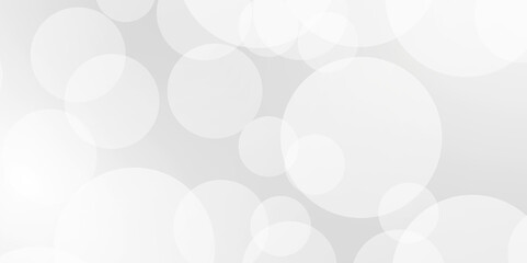 Blurry white sparkling and shiny abstract background. A brilliant blurry white background for a festive mood. Template for greeting card for entertainment.