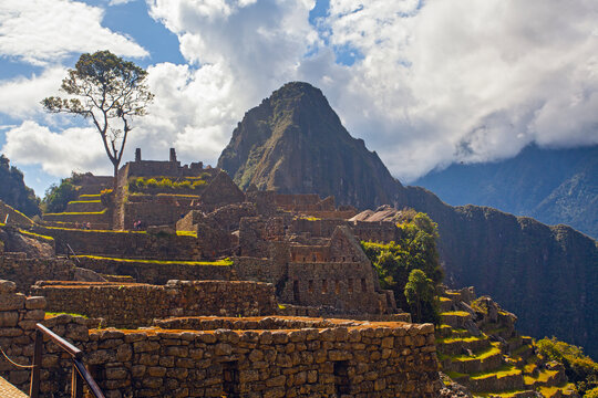 Panoramic view of Machu Picchu on a beautiful sunny day, The Valley of the Incas, Cuzco, Peru. Famous and tourist place in South America.