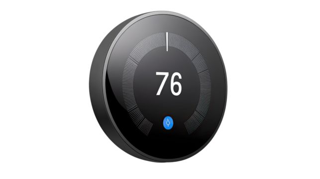 Smart Thermostat: A sleek, modern smart thermostat, displaying a digital temperature, exemplifies home automation and energy efficiency.