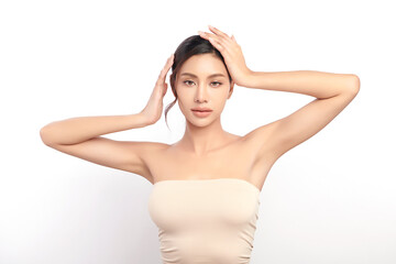 Beautiful Young Asian woman lifting hands up to show off clean and hygienic armpits or underarms on...