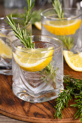 This is a great refreshing organic gin and tonic cocktail with a squeeze of lemon and rosemary....
