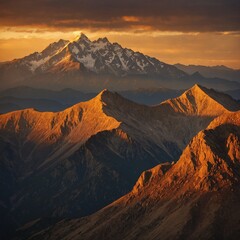 Obraz premium A golden sunset over a jagged mountain range.