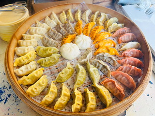 Dim sum is a traditional Chinese meal dumplings. Steamed bao buns are cooked by steaming