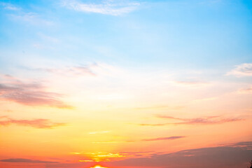 Sky,sunset, beautiful , luxury soft gradient orange gold clouds and sunlight on the blue sky perfect for the background, Sunrise on morning or everning in winter warm time ,Twilight summer,silhouette