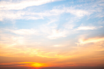 Beautiful , luxury soft gradient orange gold clouds and sunlight on the blue sky perfect for the background, take in evening,Twilight, Large size, high definition landscape photo