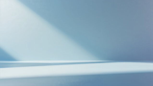 Empty light blue studio background illuminating product display area with sun rays