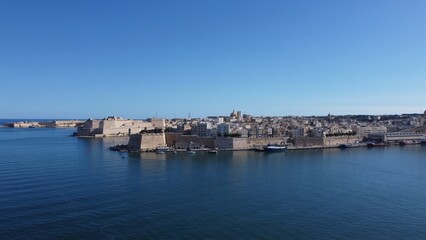 Aerial view of Gardjola gardens - safe heaven gardens, Senglea Point, revealing Fort St. Angelo on the left and Birgu waterfront with Malta Maritime museum. . High quality photo
