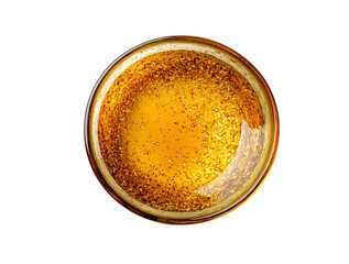 Top view of a glass bowl filled with golden oil, isolated on transparent background
