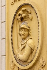 Relief on facade of former post office (altes posthaus) near to market square, Melk, Austria