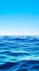 Obraz premium serene ocean view with gentle waves and clear blue sky