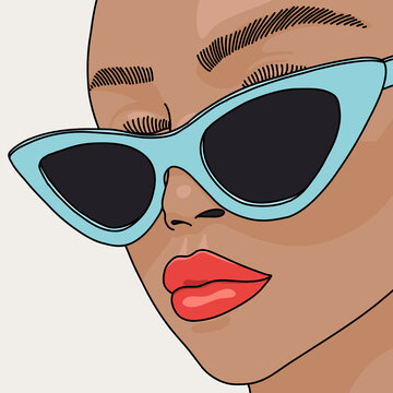 Woman Wearing Cat Eye Sunglasses and Red Lips