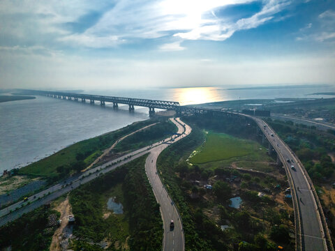 Panoramic view of Digha Ganga riverfront and JP Setu bridge in Patna, showcasing urban development alongside the tranquil flow of the Ganges.