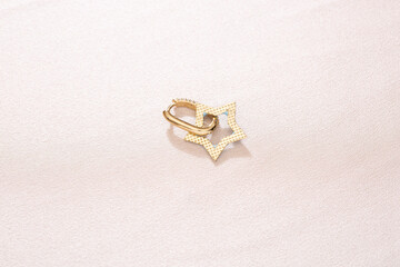 Design star colorful earrings on background