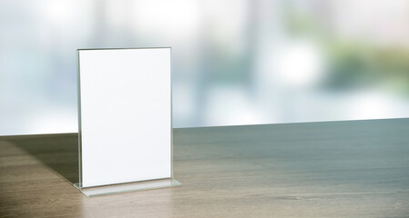 Stand Mock up Menu frame tent card blurred background design key visual layout in cafe.
