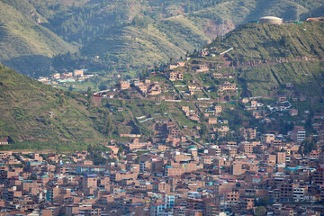 Cusco's outskirts are rapidly expanding, with new homes and buildings reshaping the historic city's landscape. The blend of tradition and modern growth tells a story of change and opportunity.