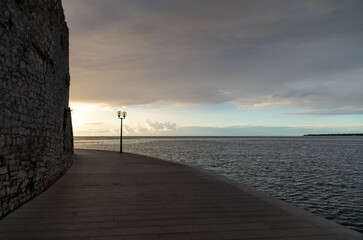 Serene Coastal Promenade at Sunset