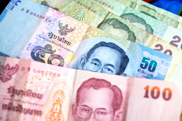 Thai baht banknotes in various denominations