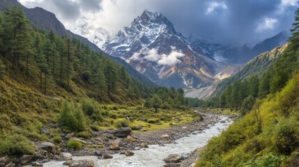 Obraz premium Majestic Mountain River Landscape: Serene Valley with Snow-Capped Peaks