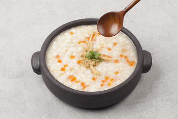 Add chicken and porridge. Cut the chicken into pieces, strain through a large sieve to loosen the...