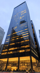 Fototapeta premium Evening wide angle photography of modern urban skyscraper architecture