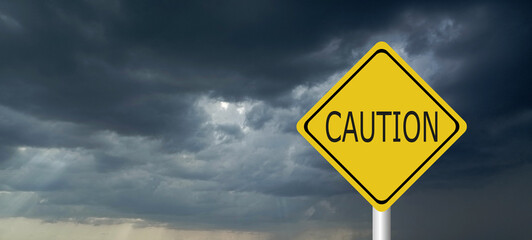 danger,caution,Hurricane Idalia warning sign against a powerful stormy background with copy space. Dirty and angled sign with cyclonic winds add to the drama.hurricane season sign on cloudy background