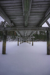 Old wooden bridge details above. Under the bridge close up.