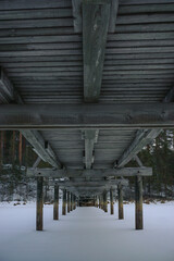 Old wooden bridge details above. Under the bridge close up.