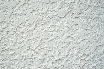 White rough plaster on wall closeup