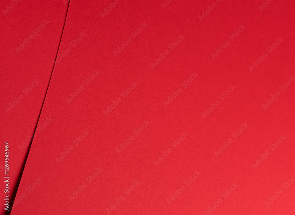 Aufkleber Bold scarlet red paper background with a deep matte texture and overlapping folds. Vibrant crimson and cherry tones create an elegant, minimal, and abstract composition with subtle geometric lines and