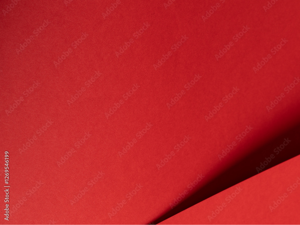 Poster Bold scarlet red paper background with a deep matte texture and overlapping folds. Vibrant crimson and cherry tones create an elegant, minimal, and abstract composition with clean geometric lines and