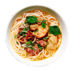 Cooked meat and noodles with some vegetables and salad on a white ceramic plate