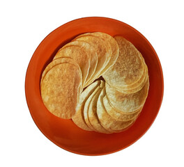 Crispy tasty round potato chips neatly arranged in a red plastic ball