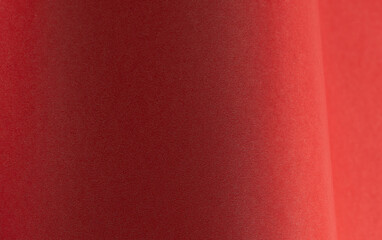 Deep carmine paper background with a velvety matte texture and subtle gradient. Rich scarlet and burgundy sophisticated, elegant, and luxurious abstract design.
