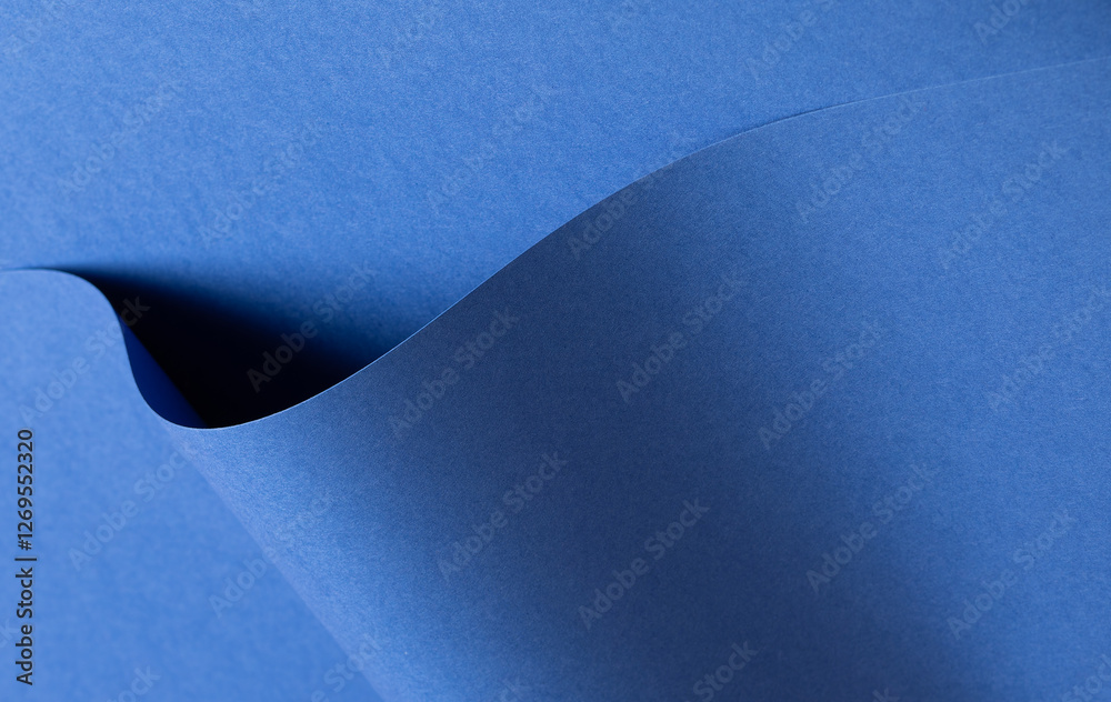 Poster Deep sapphire blue paper background with a smooth texture and overlapping curved folds. Vibrant cobalt and ultramarine tones create a minimal, rhythmic, and flowing abstract composition with wavy
