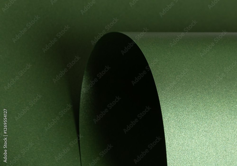 Poster Emerald green paper background with a pearlescent, glossy texture and shimmering wavy edges. elegant, luxurious, and sophisticated abstract design.